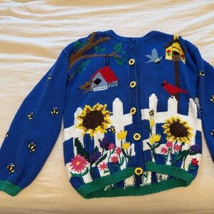 Colorful Knit Cardigan with Floral and Birdhouse Design